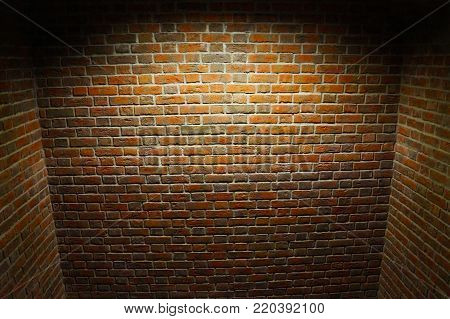 Prison cell, walls of raw bricks, dark and cold