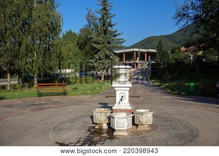 SAPAREVA BANYA, BULGARIA- AUGUST 13, 2013: The geyser with hot water in Spa Resort of Sapareva Banya, Bulgaria