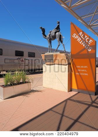 Alice Springs, Australia - September 7, 2017: The famous Ghan railway at the Alice Springs terminal with a local sign