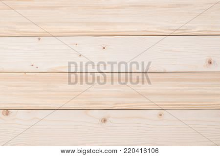 White Finland pine wood woodgrain texture background in natural beige brown color