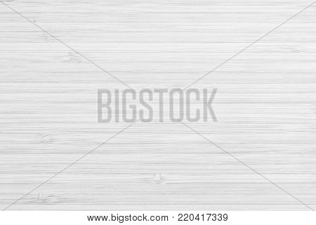 White wood texture bamboo wooden kitchen cutting board grainy detail background in light grey color