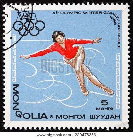 MONGOLIA - CIRCA 1967: a stamp printed in Mongolia shows figure skating, 10th Winter Olympics Ganes, Grenoble, France, circa 1967