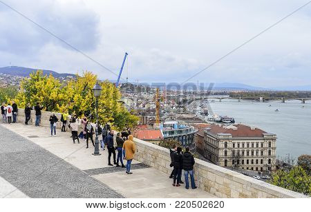 BUDAPEST, HUNGARY- 28 OCTOBER 2017: Tourists on a viewing platform of the Royal Palace in Budapest.
