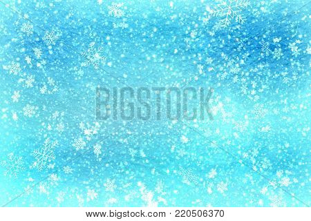 Blue Christmas background snow texture, abstraction, white snowflakes. Christmas background, winter Wonderland