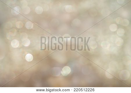 fuzzy golden blurred background with bright bokeh