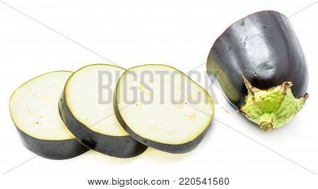 Sliced eggplant (aubergine), cut in round circles, isolated on white background