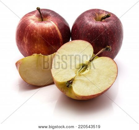 Gala apples, two whole, one half and slice, isolated on white background