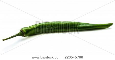 One whole Chilli pepper, green Cayenne, isolated on white background