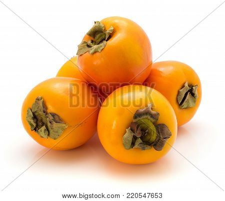 Persimmon Kaki isolated on white background five whole orange
