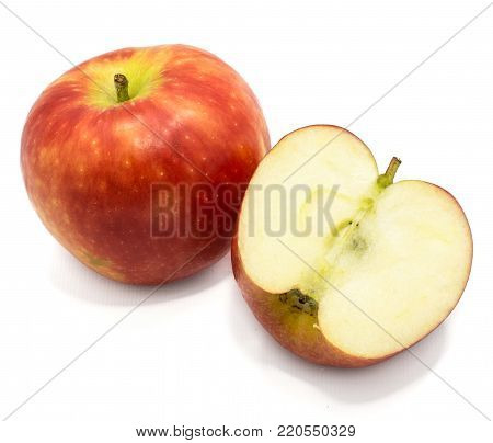Kanzi apple, one half, isolated on white background