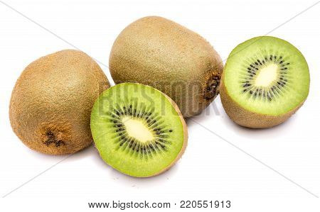 Two whole kiwi fruits (Chinese gooseberry) and two halves isolated on white background