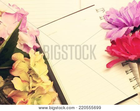 Note Book Diary And Beautiful Flower Bouqet With Vintage Filter Instragram Effect;