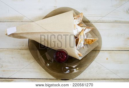 High Calories Fried .dessert With Raspberry Jam And Powdered Sugar. Tasty Breackfast On The White Wo