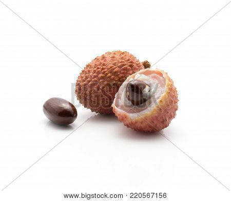 Lychee stack isolated on white background ripe pink fresh two berries peel with one chicken tongue seed