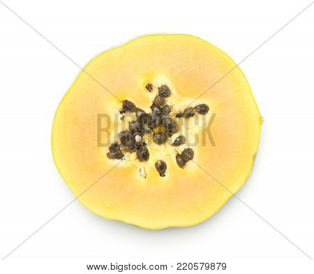 Green papaya half (pawpaw, papaw) top view with seeds orange flesh isolated on white background cut in ring