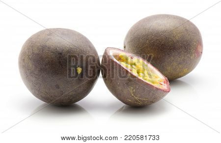 Passion fruits isolated on white background two whole one half