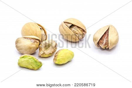 Group of pistachio nuts isolated on white background