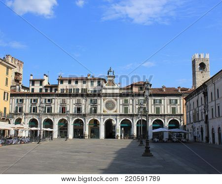 The clock tower on the Piazza della Logia in Brescia. Italy .