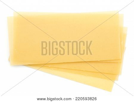 Lasagne raw sheets fan top view isolated on white background