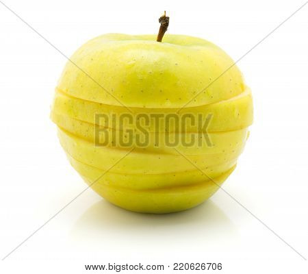 Sliced apple (Smeralda variety) isolated on white background one whole