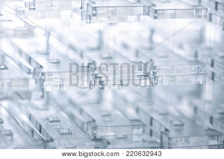 Abstract high-tech background. Details of transparent plastic or glass. Laser cutting of plexiglass.