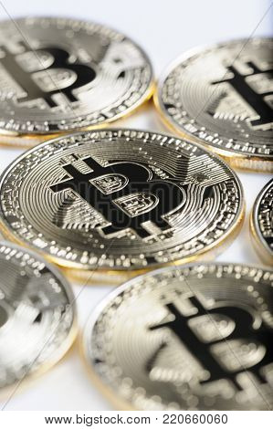 Macro view of shiny Bitcoin souvenire coins as background, selective focus