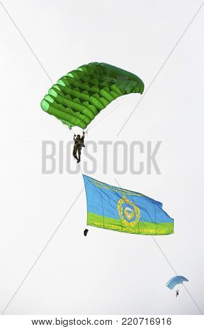 Alabino, Moskow region, Russia - July 29, 2017: Russian paratroopers demobilized with a flag walking during the Feast of Russian Air Assault Troops
