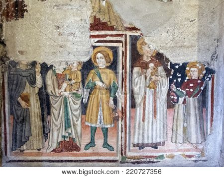 NARNI, ITALY - JULY 18, 2017: Narni (Terni, Umbria, Italy): interior of the medieval church of Santa Maria Impensole, frescos by unknown medieval painter discovered in the 1960s