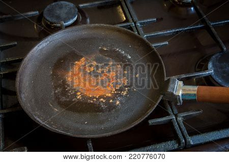 rusty cast ironrusty cast iron for pancakes on the stove