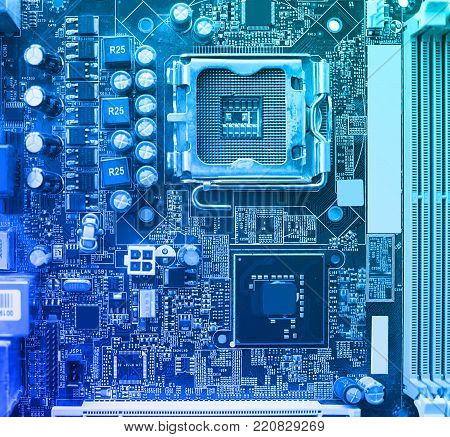 Photo close up of a motherboard and computer components. The concept of the future is the industrial and innovation. Electronic circuit board.