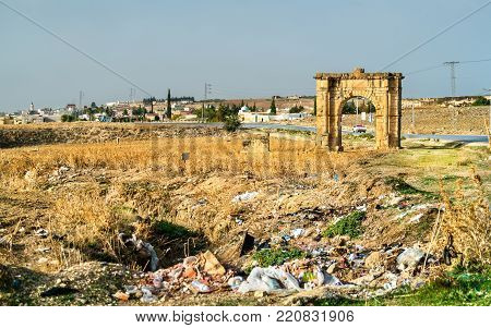 Ancient Roman Triumphal Arch In The Tunisian Countryside Near Dougga And Al Karib. North Africa