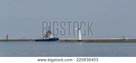 TUGBOAT - The tug boat enters the sea port