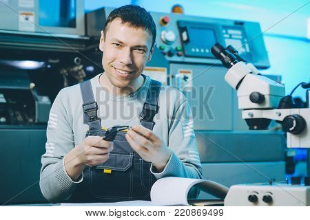 quality control part metal worker machine male