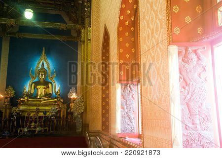 BANGKOK , THAILAND - DECEMBER 29 , 2017 : Phra Puttha Jinnarat, a copy main altar with seated Buddha of Wat Benchamabophit Dusitvanaram also known as the marble temple, it is one of Bangkok's best-known temple and major tourist attraction.
