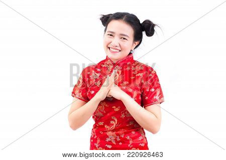 Asian Woman Wearing Chinese Dress Cheongsam With Gesture Of Congratulation, Bring The Hands Together