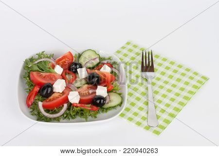 Traditional Greek Sallad With Black Olive On White Plate On White Background.
