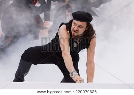 ST. PETERSBURG, RUSSIA - JULY 19, 2017: Pavel Shmulevich in the opera The Marksman of C. M. von Weber outdoors during the festival All Together Opera. It was third of 4 performances