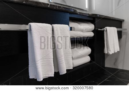 Close Up Of Luxury Bathroom Towels In A Monochrome Ensuite