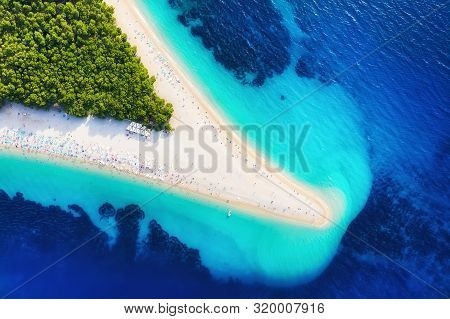 Croatia, Hvar Island, Bol. Aerial View At The Zlatni Rat. Beach And Sea From Air. Famous Place In Cr