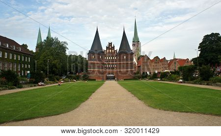 Lubeck, Germany - 07 26 2015 - Scenic View Of Holsten Gate Or Holstentor In Old Town, Beautiful Arch