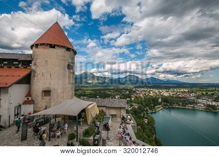 Bled, Slovenia - July 14, 2019: Panoramic View Of Blejski Grad And Bled Lake In Slovenia