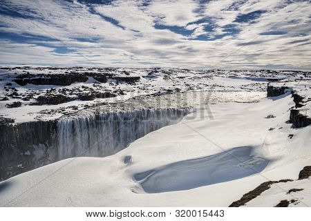Dettifoss Waterfall On The Jokulsa A Fjollum River In Northern Iceland, The Most Powerful Fall In Eu