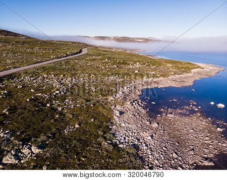 Aerial View. Road Crossing Hardangervidda Plateau, Norway Landscape. National Tourist Hardangervidda