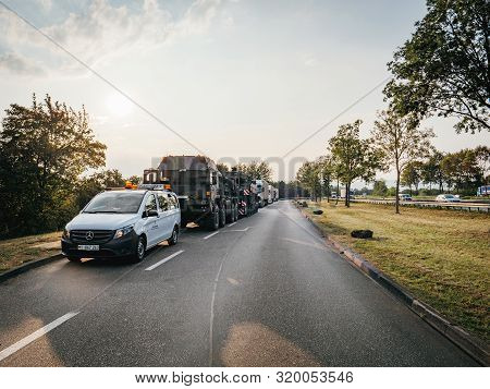 Cologne, Germany - Aug 29, 2019: Large Convoy Of Military Vehicles One Trapos Ring A German Tank Bun