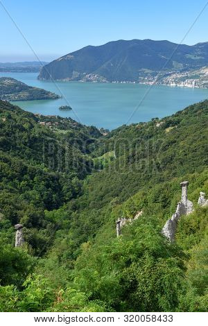 Monument Rocks (chalk Pyramids) Of Zone At Lake Iseo In Italy