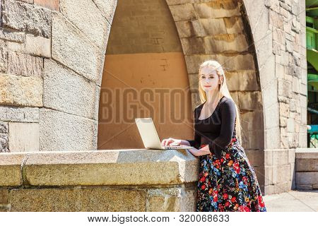 American Teenage College Student Studying In New York, Wearing Black Long Sleeve T Shirt, Patterned 