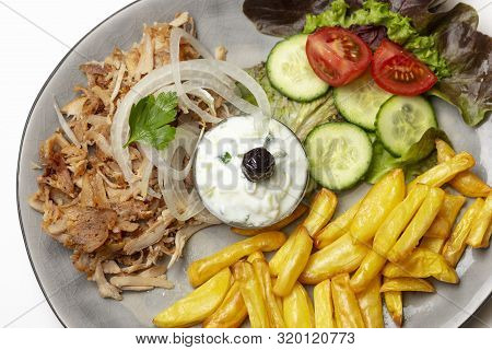 Overview Of Greek Gyros With Tzaziki And Fries