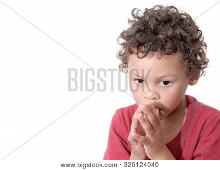 Boy Praying To God Stock Image With Hands Held Together With Closed Eyes Stock Photo