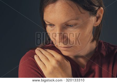 Sensual Melancholic Female Portrait, No Makeup And No Retouching. Adult Caucasian Woman Looking Let 