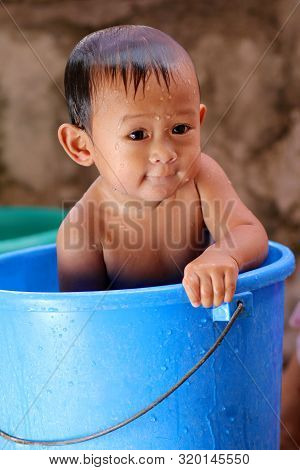 Cute Little Baby Enjoying His Morning Bath